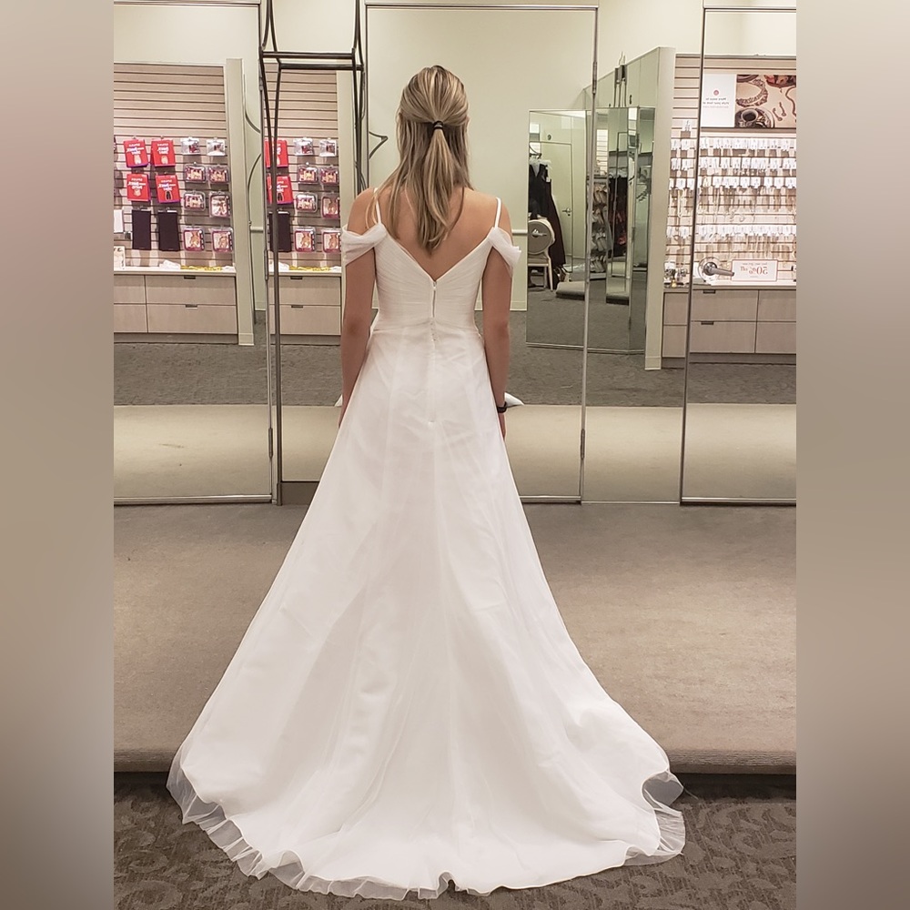 David’s Bridal brand new (with tags) wedding gown.